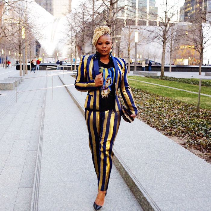 _The-Bomb-Life-101--Set-Specific-Goals-and-Write-Them-Down-Wearing-a-Kimberly-Goldson-Striped-Suit,-Balenciaga-T-Shirt,-and-Christian-Louboutin-Black-So-Kate-Pumps