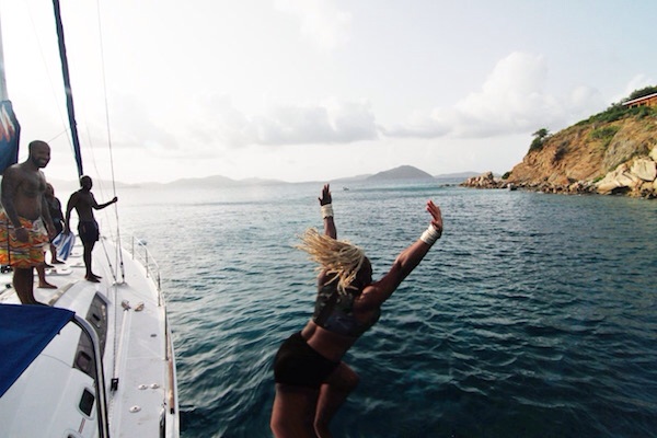 claire jumping into the ocean summer sizzle bvi 2014