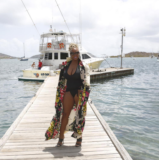 8 claire sulmers bvi A Simply Intricate Floral Jacket, Norma Kamali Swimsuit, Great Bag Co Bag, and Iylia Black Mules