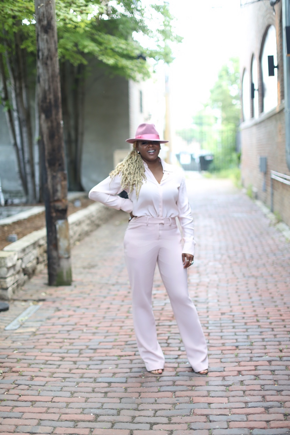 Cocktails with Claire x Miss Diddy Chicago in a Sergio Hudson Pink Top, Pants, and a Borsalino Hat