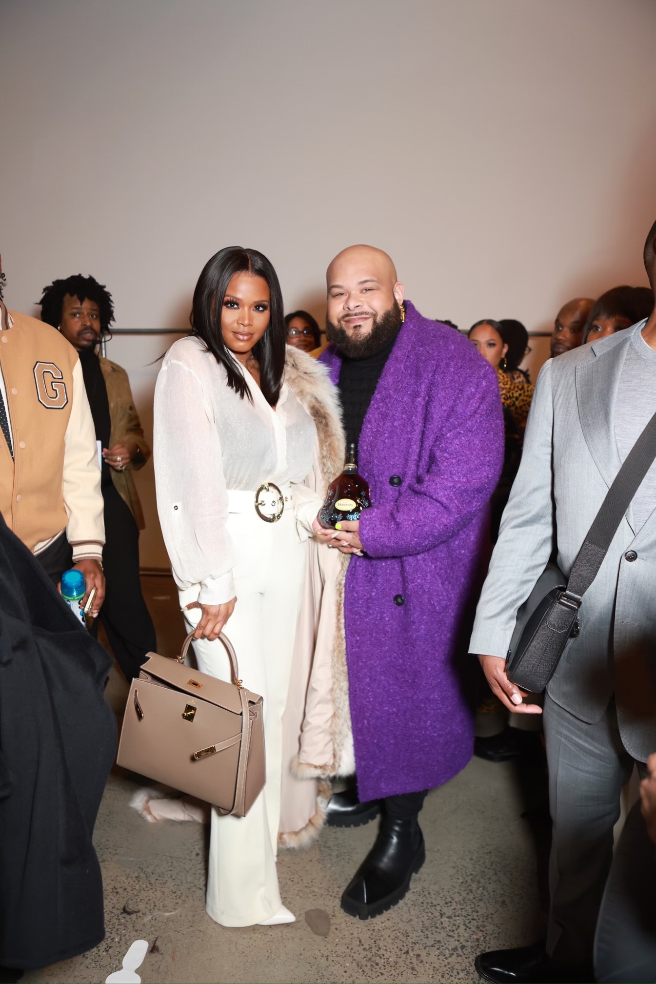 Kimora Lee Simmons with a red Birkin Bag.